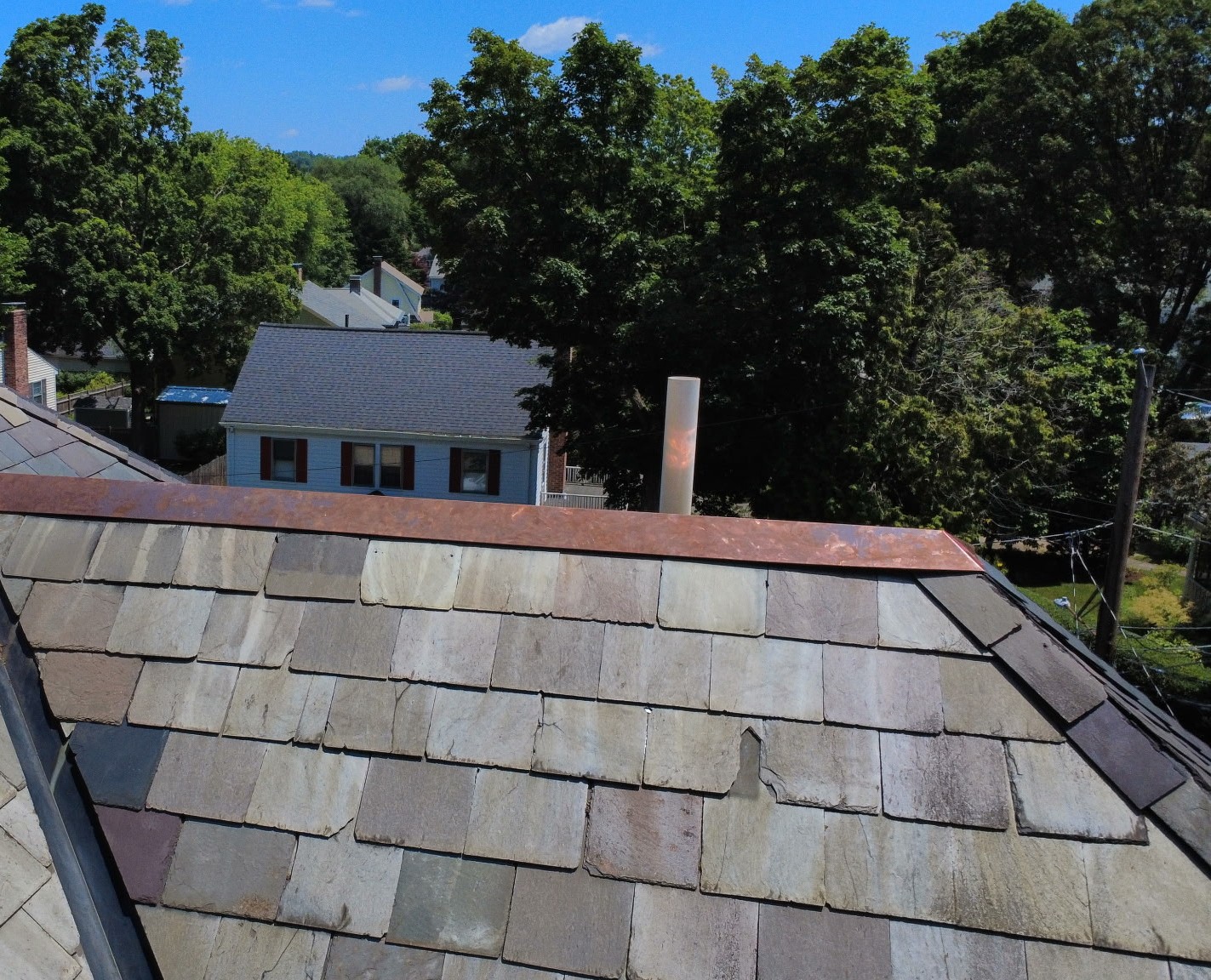 After Pitched Roof in Cambridge, MA - Slate Roof & Copper Ridge Cap Restoration